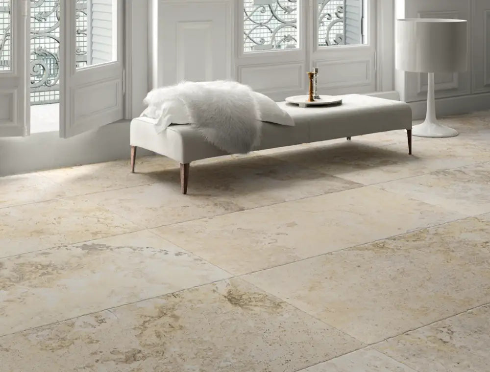 Aurum Travertine Outdoor Porcelain Paving Slabs installed indoors. Durable and stylish flooring option for any space