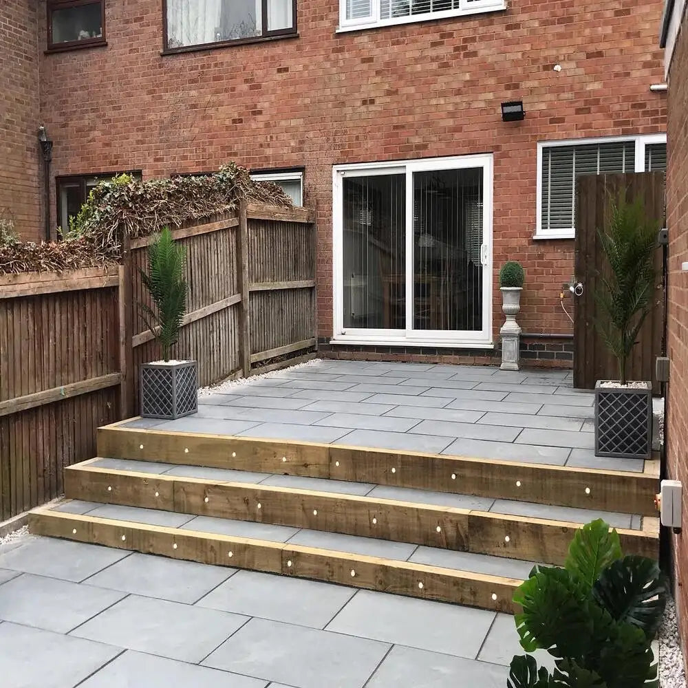 Grey Brazilian Slate Paving Slabs arranged in a path with stairs