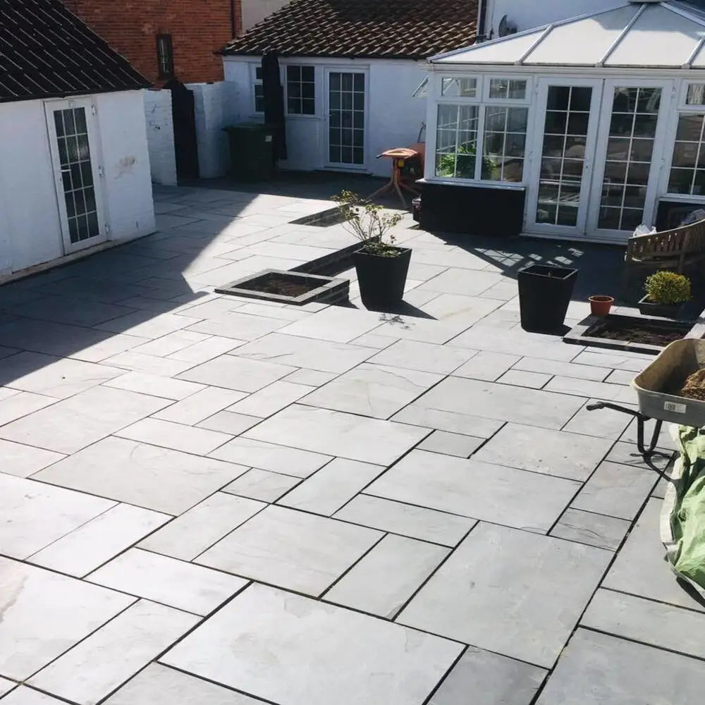 Grey Brazilian Slate Paving Slabs for garden walking area.