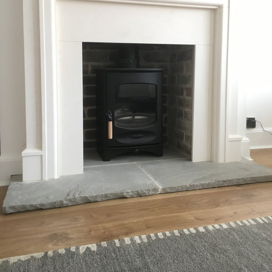 How to Install a Hearth on a Fireplace