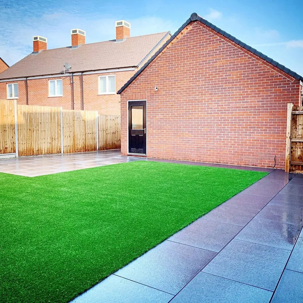 Image of Primethorpe Artificial Turf in a 30mm (X-Short) blade length, providing a neat and tidy appearance for your outdoor space. The realistic look and feel of this artificial grass make it an excellent choice for any garden or landscaping project.