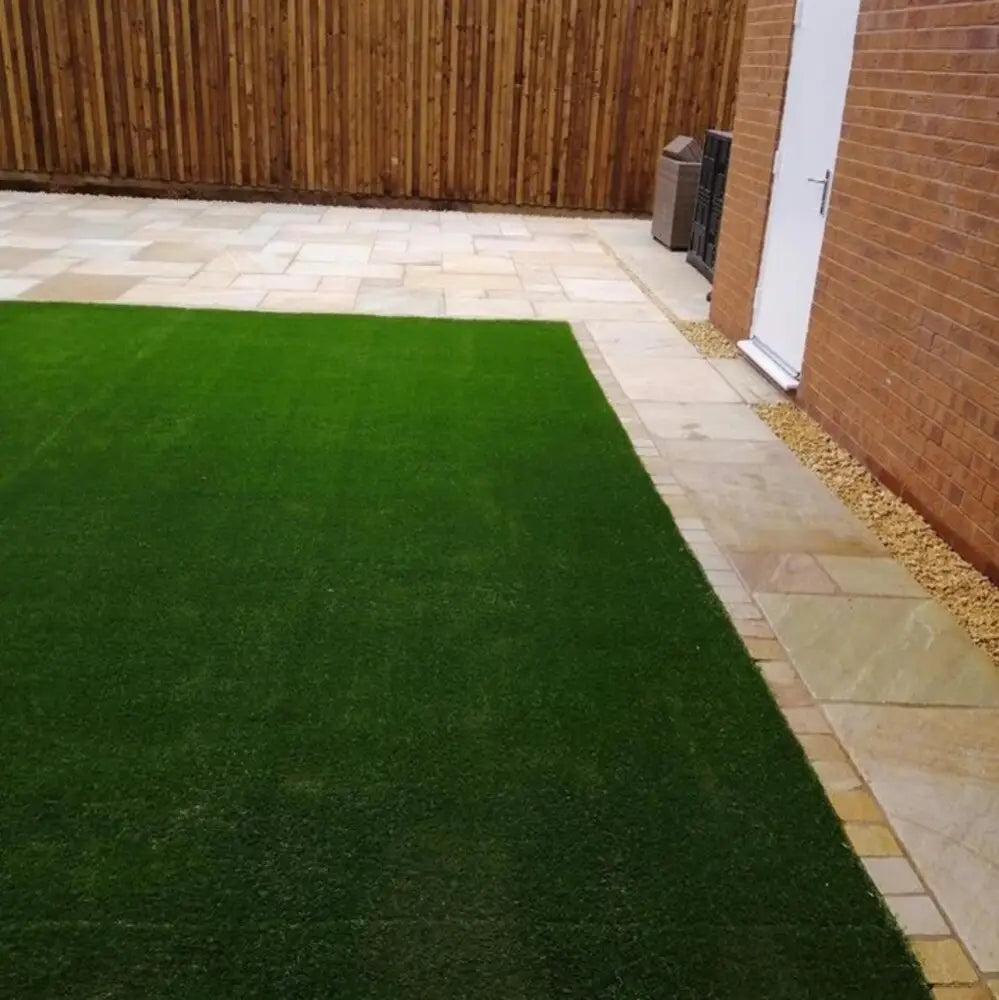 Image of a close-up view of Primethorpe Artificial Turf, showcasing its realistic and lush appearance. This artificial grass is an excellent choice for those who want a low-maintenance outdoor space that looks and feels just like real grass.