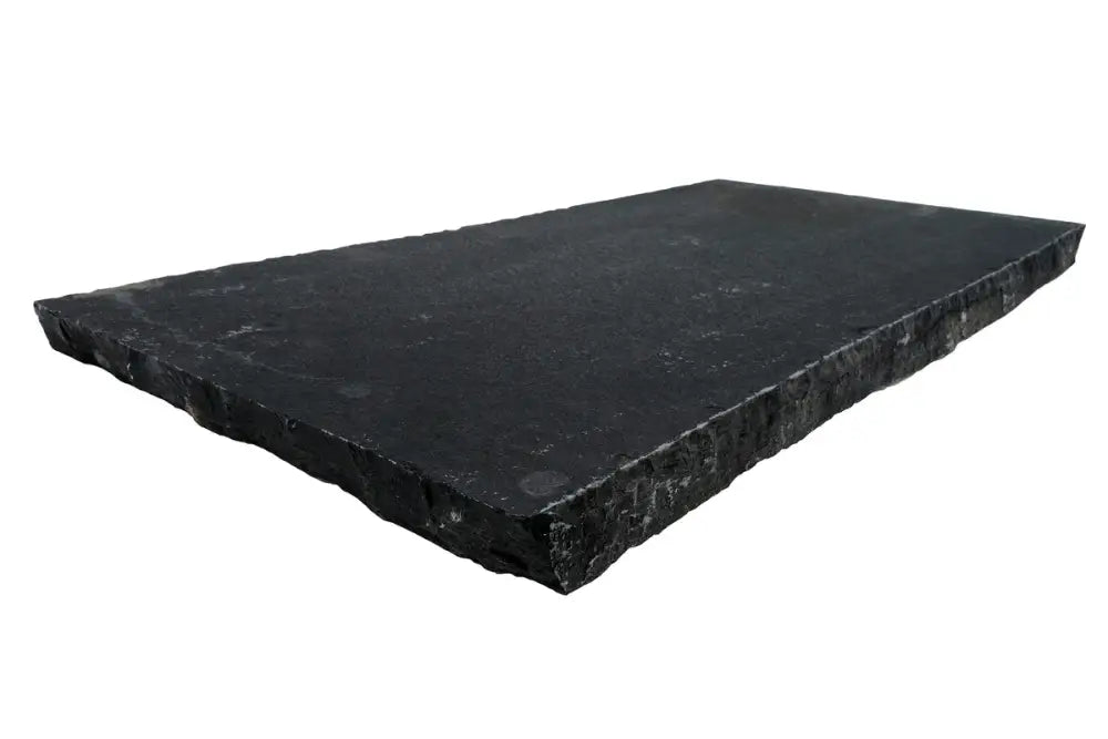  Black limestone coping stone with hand-dressed edge, 60cm x 30cm.